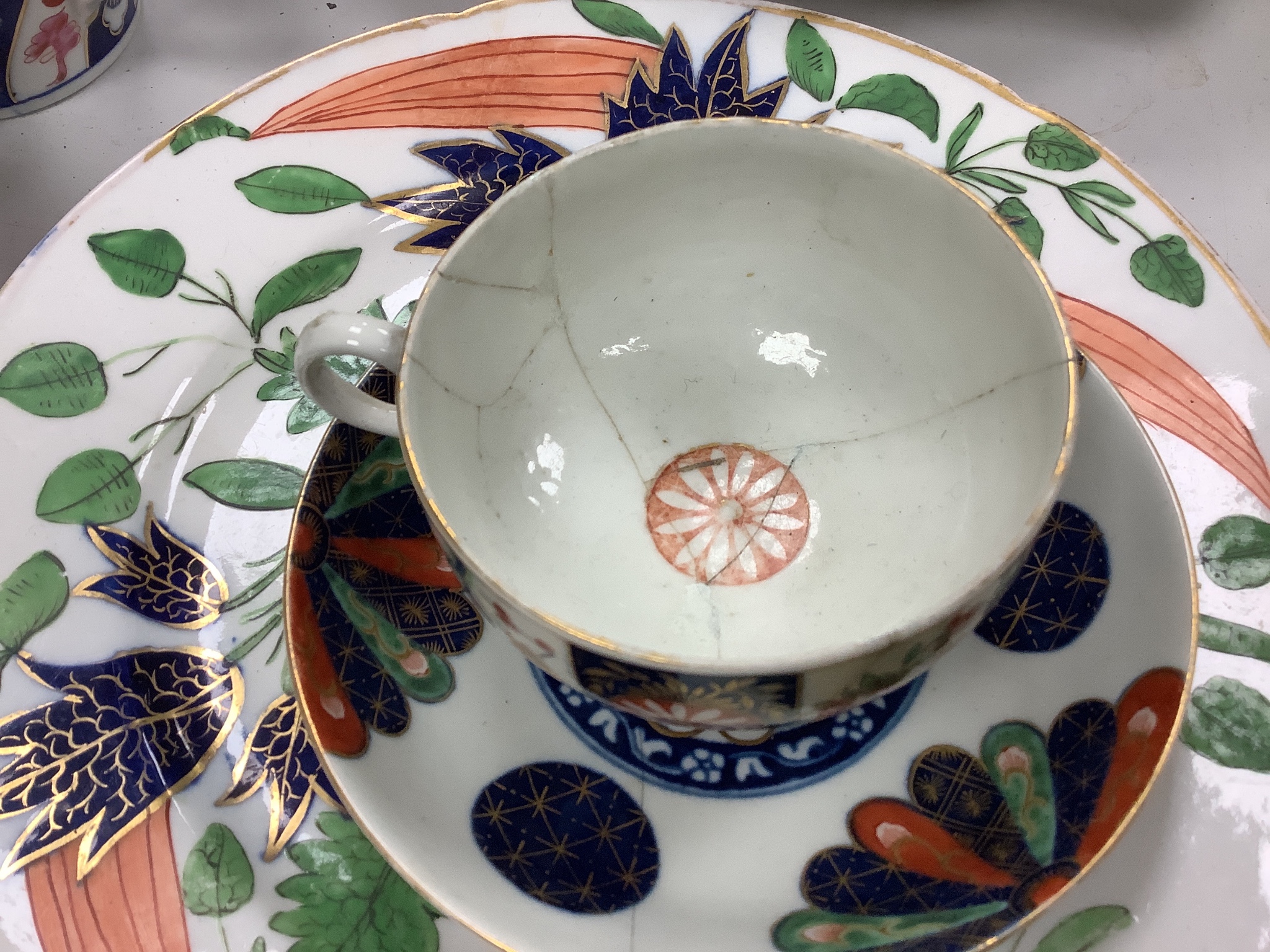 An Assortment of 18th century Worcester and Chelsea porcelain tableware and a Derby figure, damaged